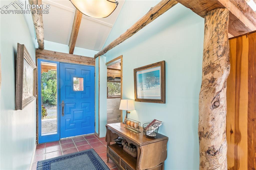 Image 8 of 50: Entryway with tile patterned flooring
