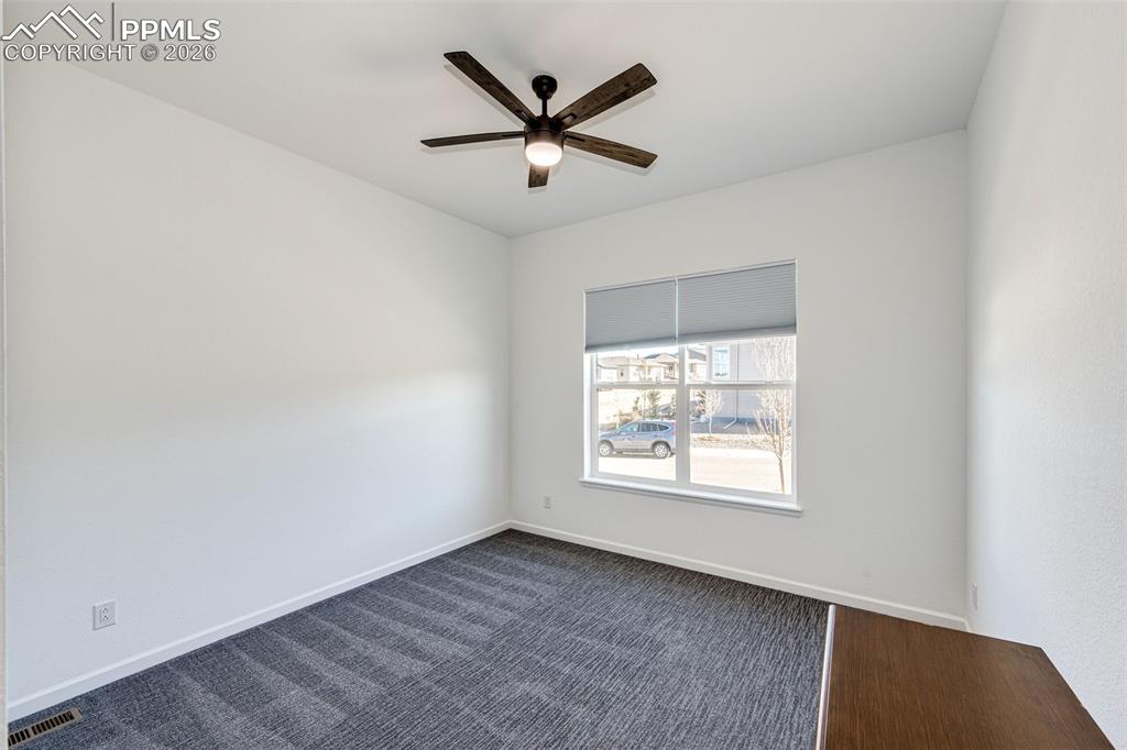 Image 13 of 39: Front Bedroom