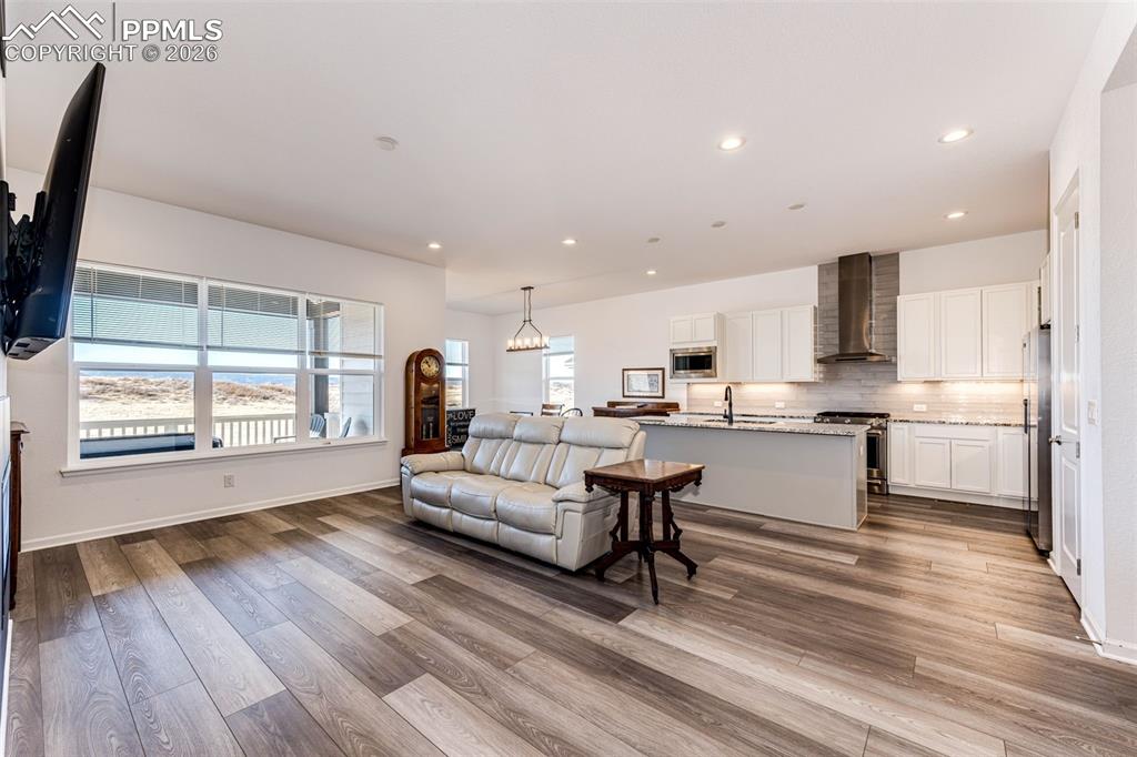 Image 6 of 39: Living Room Looking into Kitchen