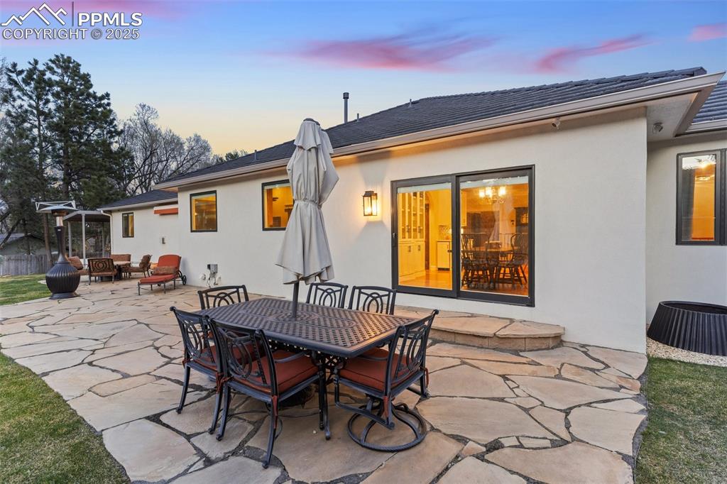 Image 48 of 50: View of patio / terrace with outdoor dining space