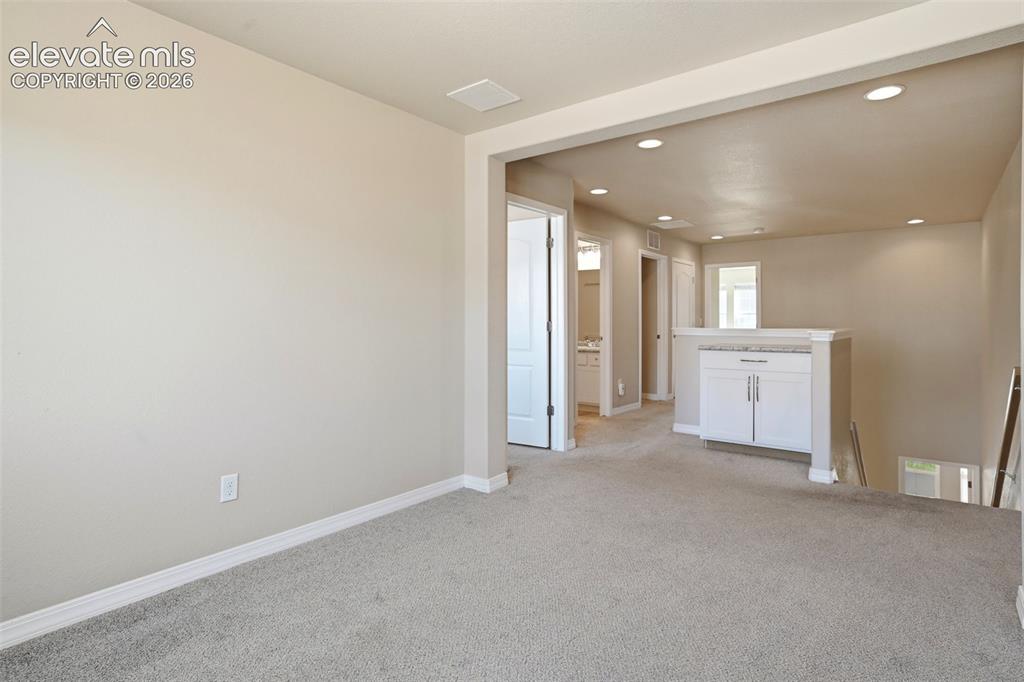 Image 39 of 45: Spacious flex space.