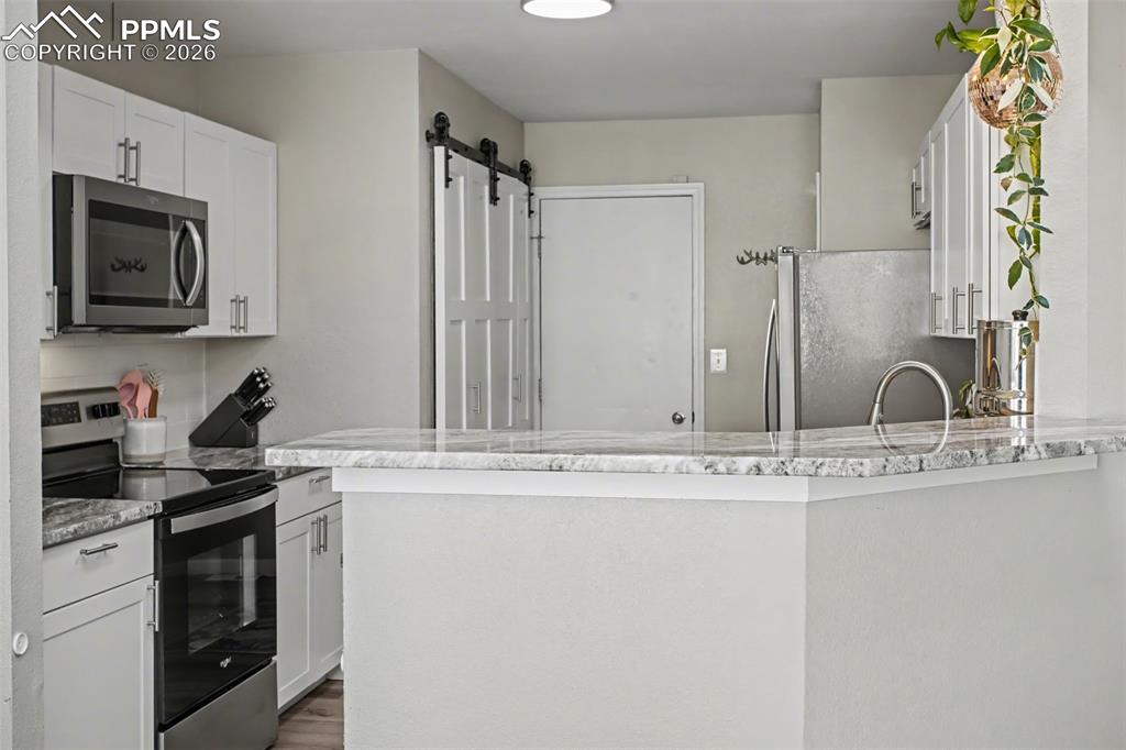 Image 13 of 34: Kitchen