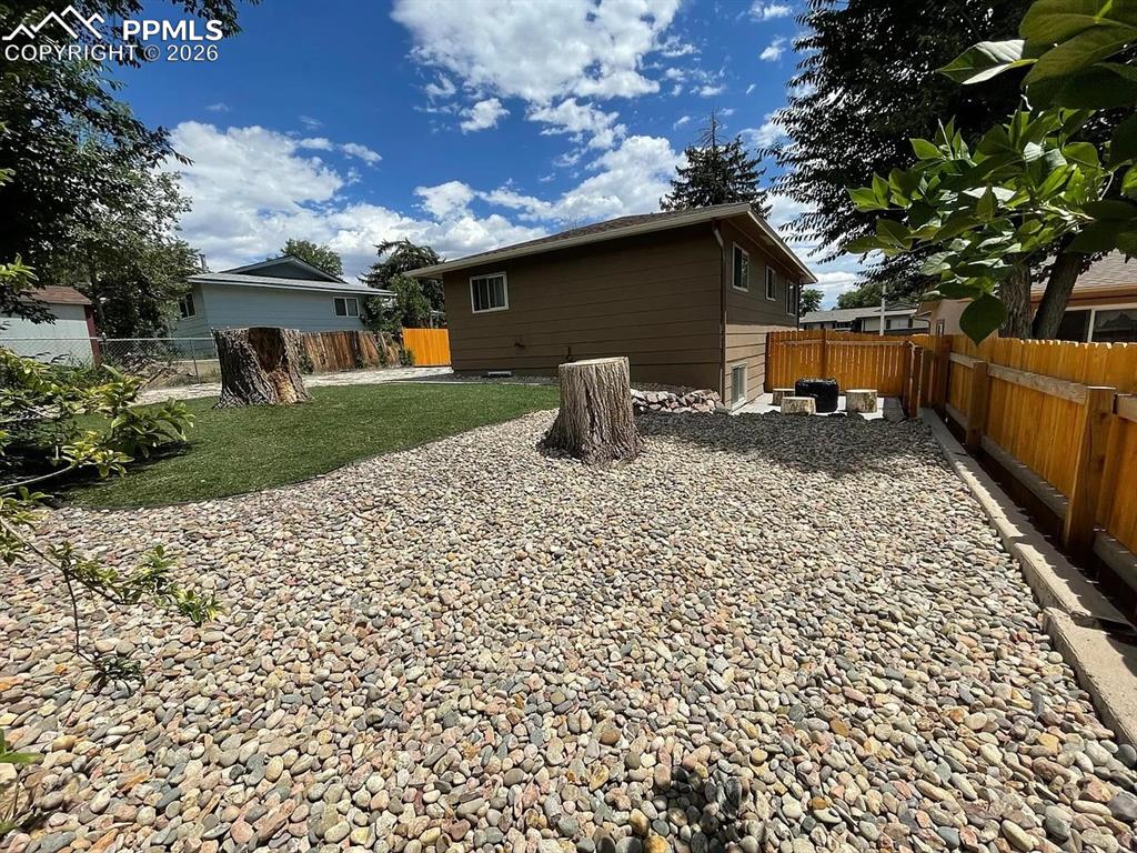 Image 14 of 14: turf in backyard and shed