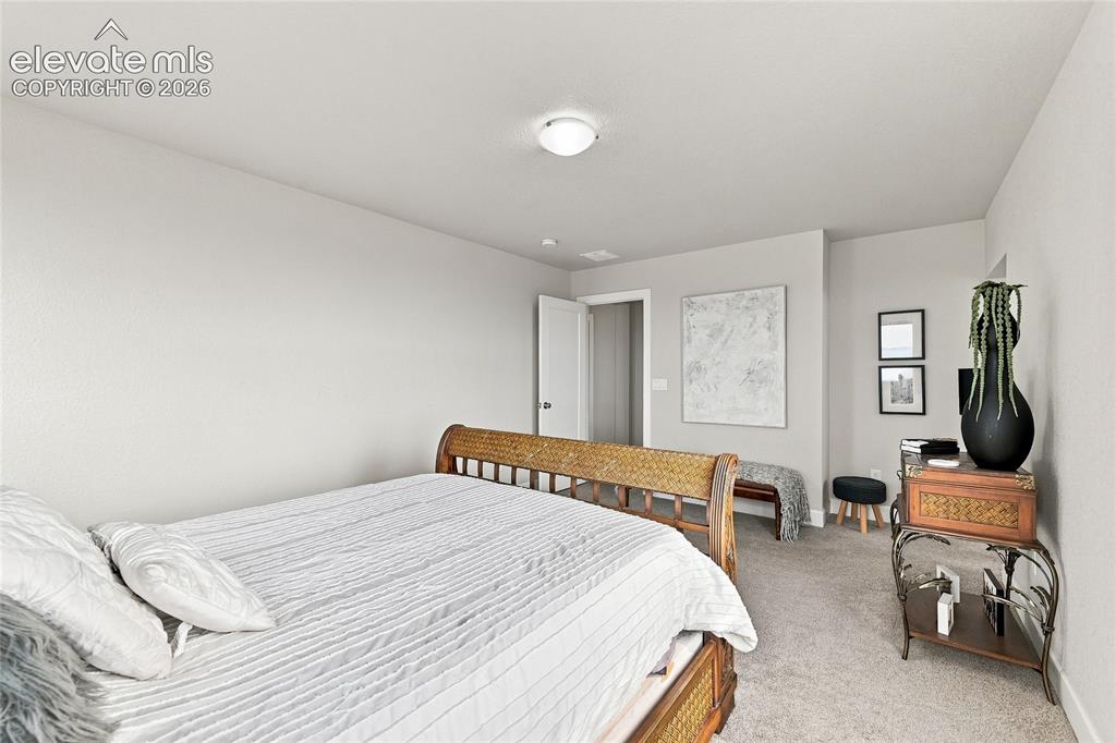 Image 23 of 29: Master Bedroom