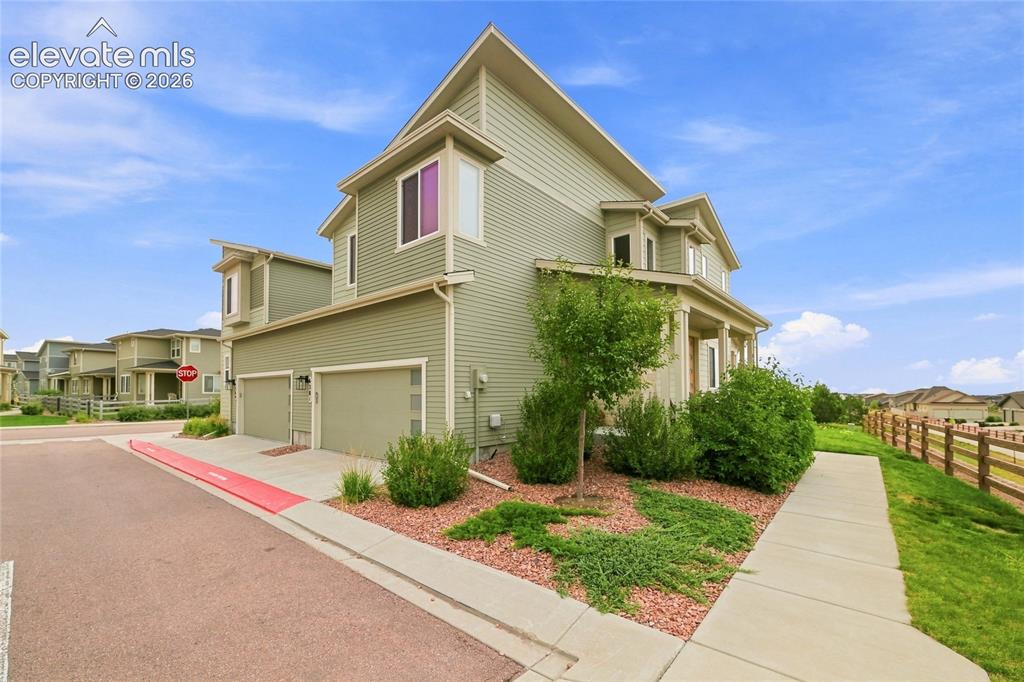 Image 3 of 29: OVERSIZED 2 CAR GARAGE W/STORAGE