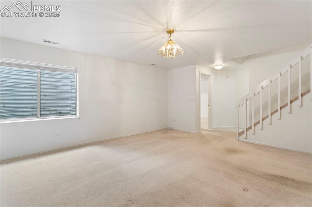 Image 21 of 38: Garden Level Basement!