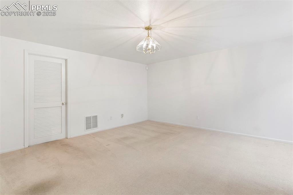 Image 24 of 38: Huge Basement Storage Area!
