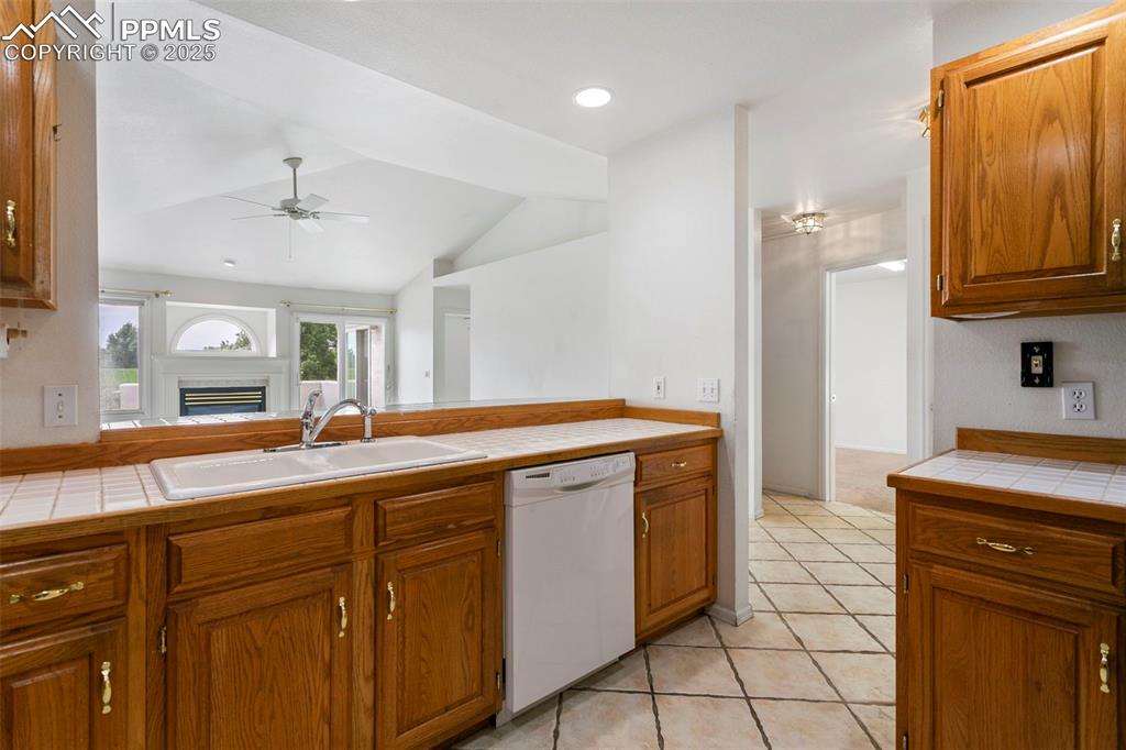 Image 6 of 38: Kitchen Opens to Dining Room!