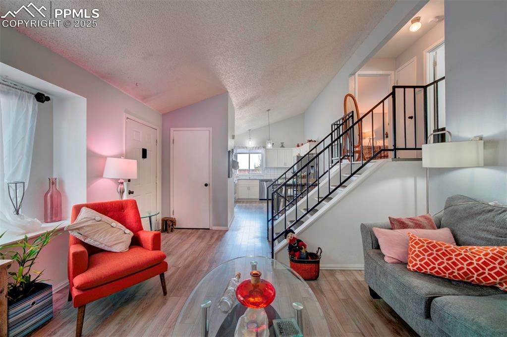 Image 5 of 36: view of the open floor plan facing the kitchen