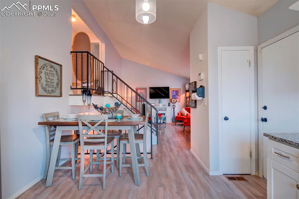 Image 8 of 36:  Dining space, as well as pantry off to the side of the entry to the garage