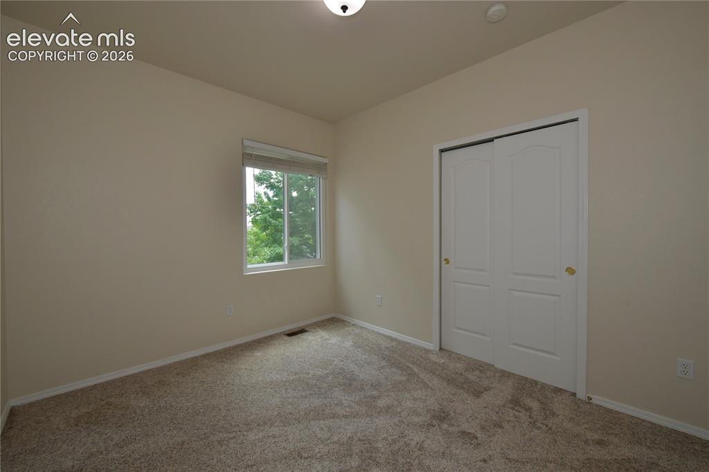 Image 14 of 23: Bedroom