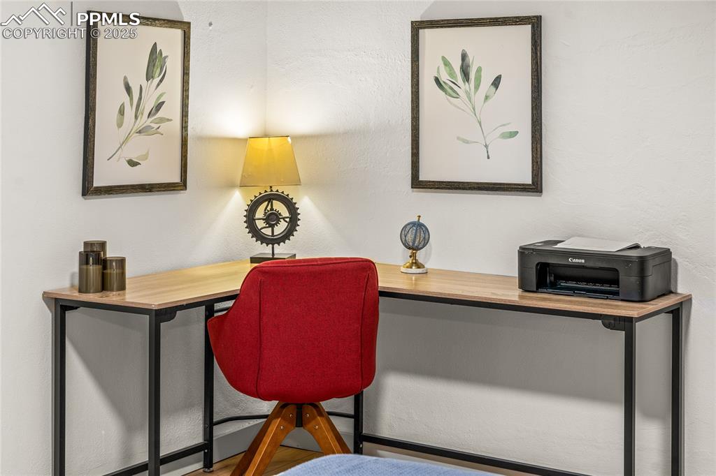 Image 29 of 42: Office featuring a textured wall