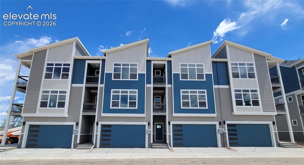 Caption: Peak View-Modern Elevation-Interior Unit-2 Car Garage-Townhome-Backs to Open Space-Desirable Centenn