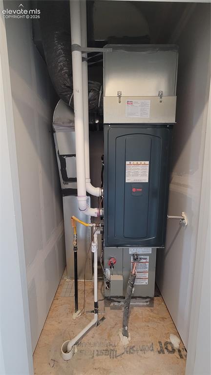 Image 29 of 32: Utility closet on upper level with 96% energy efficient furnace! 