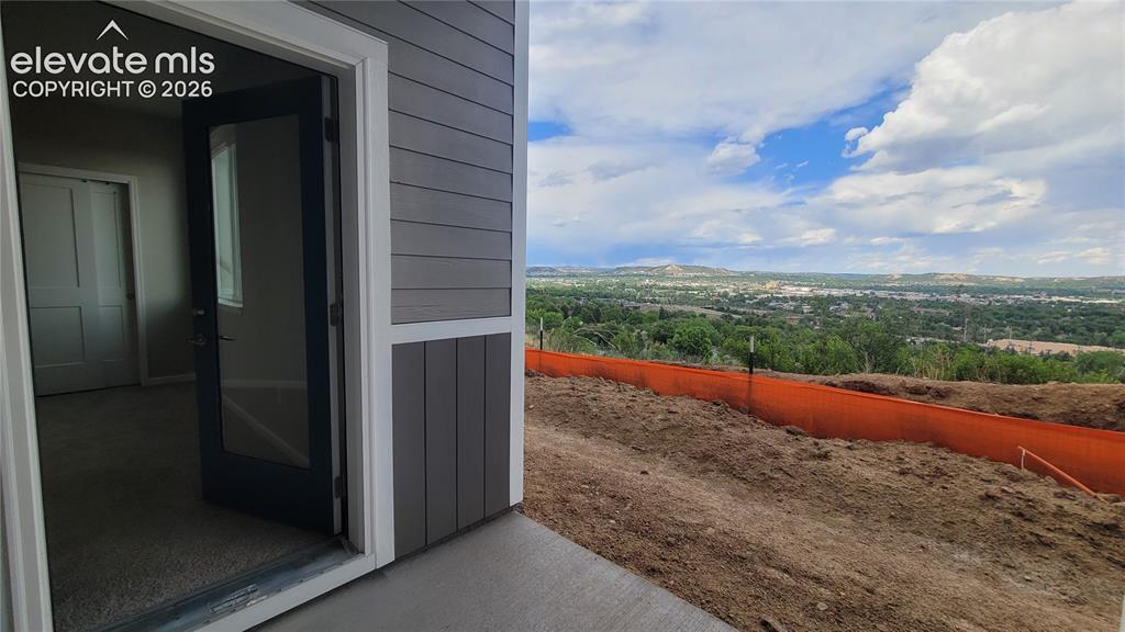 Image 8 of 32: Patio off the Junior Suite, yielding views to the East!