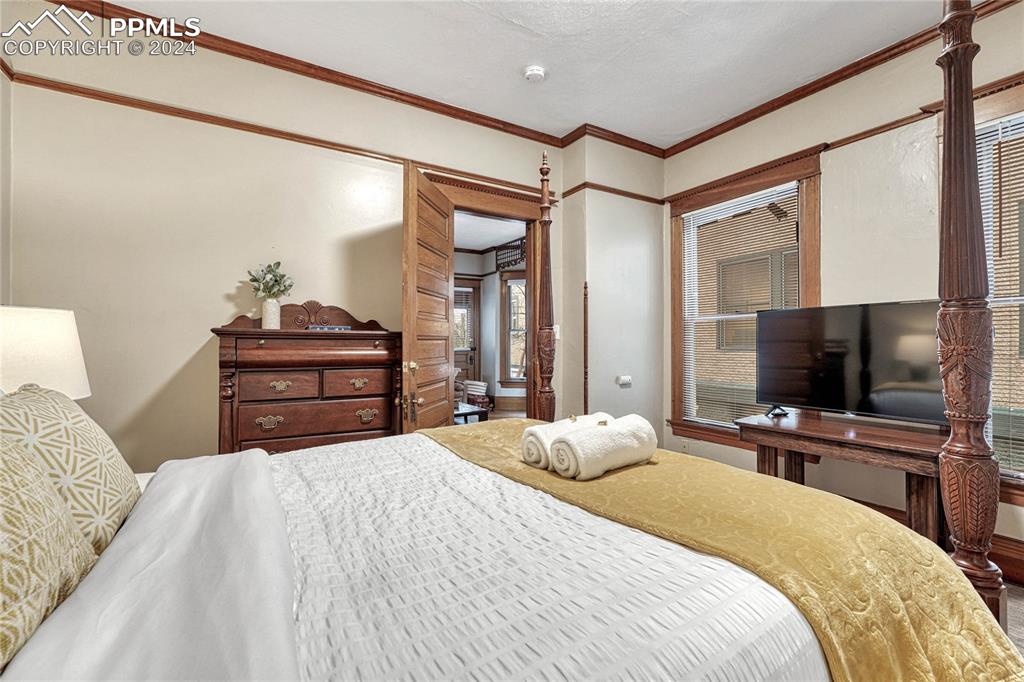 Image 23 of 50: Spacious Bedroom, Carpeted Floor,