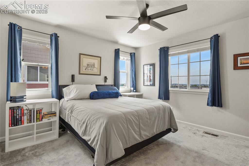 Image 10 of 20: Primary bedroom with en-suite bath and walk-in closet