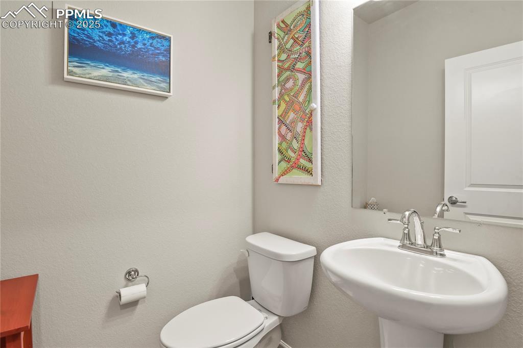 Image 9 of 20: Main level powder bath