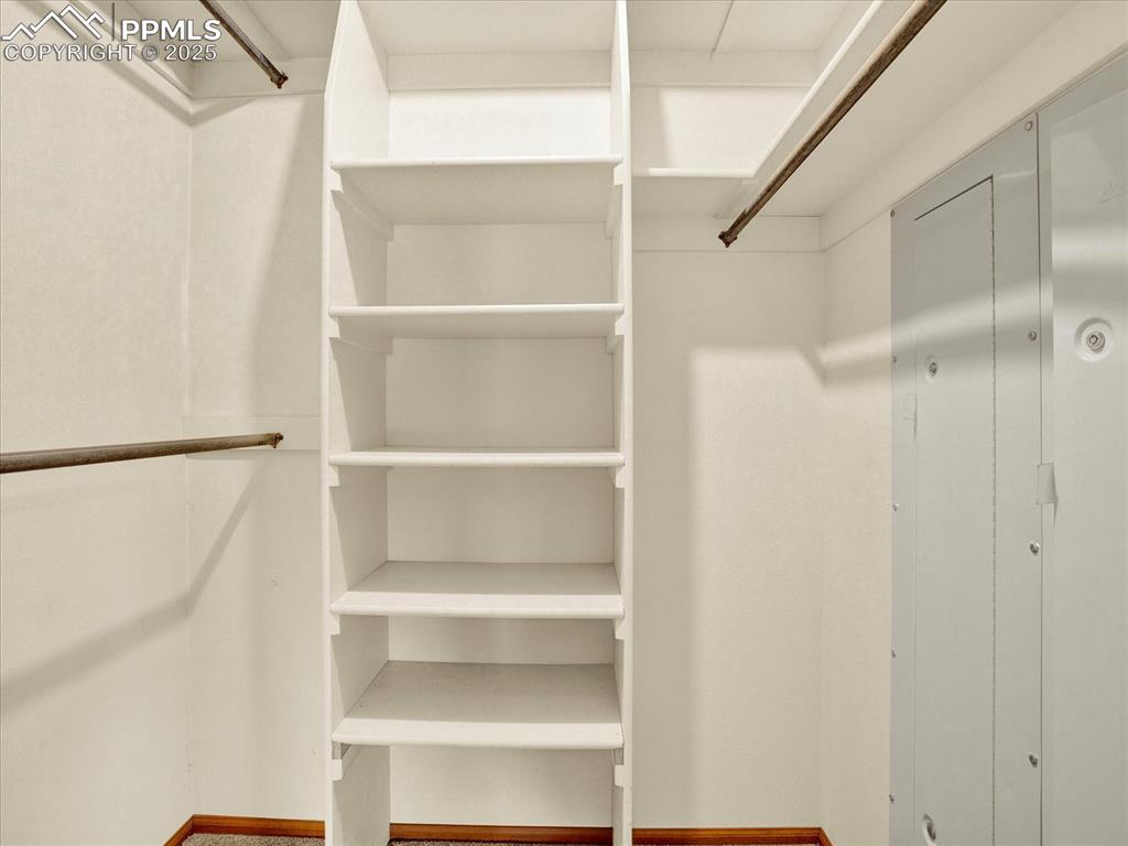 Image 17 of 30: Primary Closet