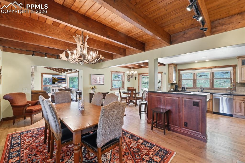Image 17 of 50: Seating will never be an issue, as this open floorplan provides room for a