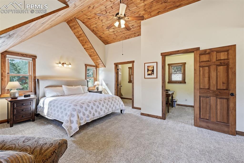 Image 25 of 50: Farmhouse sink is accompanied by picturesque windows, so you can get lost i