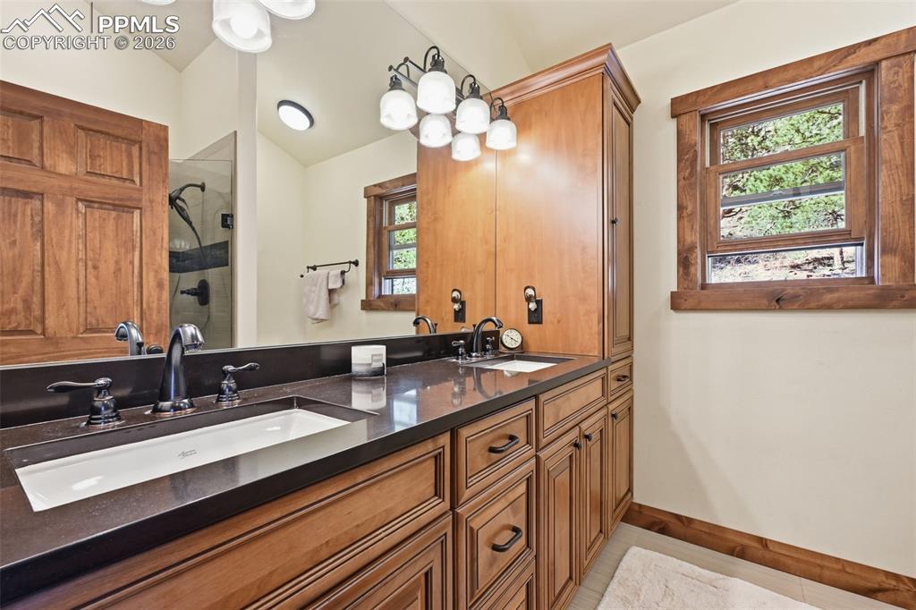 Image 29 of 50: The primary retreat offers dual sinks and tons of storage and countertop sp