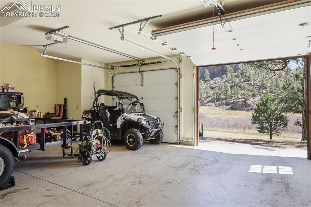 Image 42 of 50: Independent bays with garage openers.