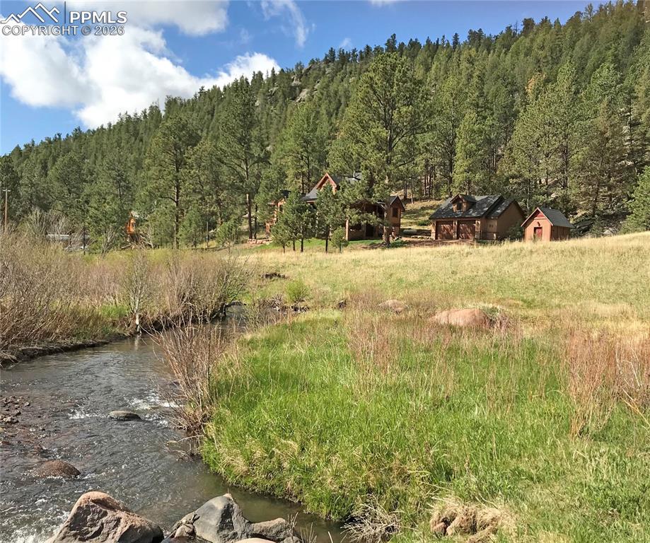 Image 50 of 50: Fourmile Creek offers fishing and relaxation; all just steps away.