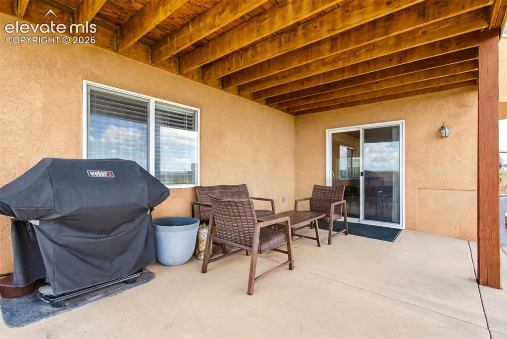 Image 30 of 44: Spacious covered patio 