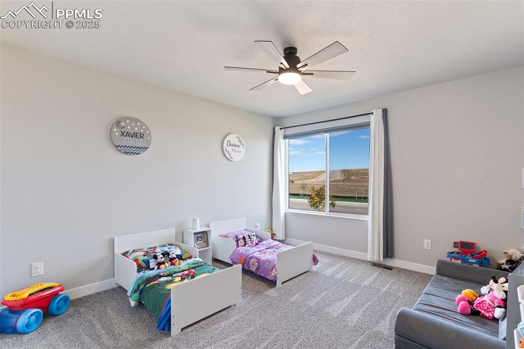 Image 20 of 26: Playroom featuring carpet and a ceiling fan