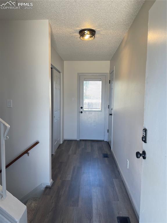 Image 14 of 23: Entryway / Backyard and Garage Access