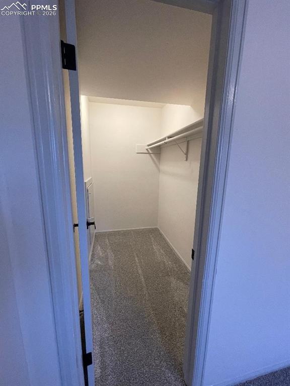 Image 20 of 23: Walk In Closet Downstairs Bedroom #4