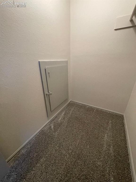 Image 21 of 23: Walk In Closet Downstairs Bedroom #4 (Crawlspace entry) 