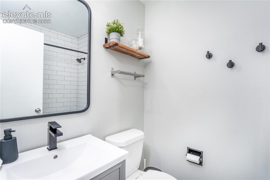 Image 14 of 50: Upstairs Hallway Bathroom