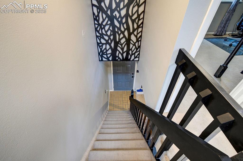 Image 40 of 48: Stairs with baseboards