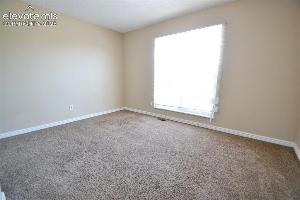 Image 12 of 42: Bedroom