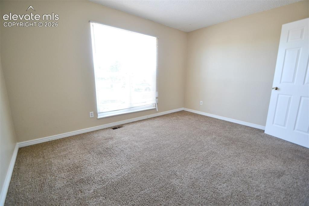 Image 13 of 42: Bedroom