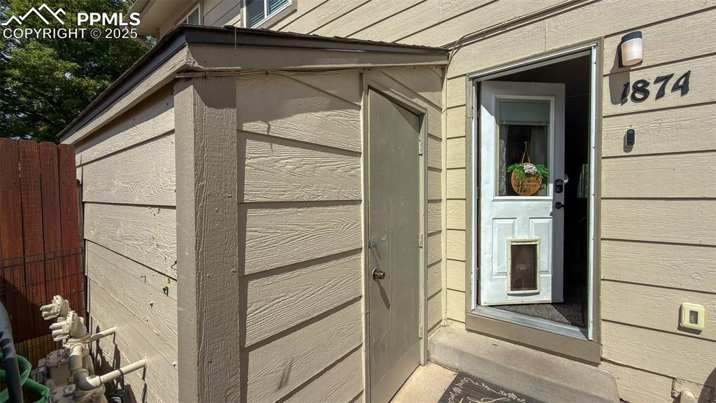 Image 27 of 35: Storage in back patio
