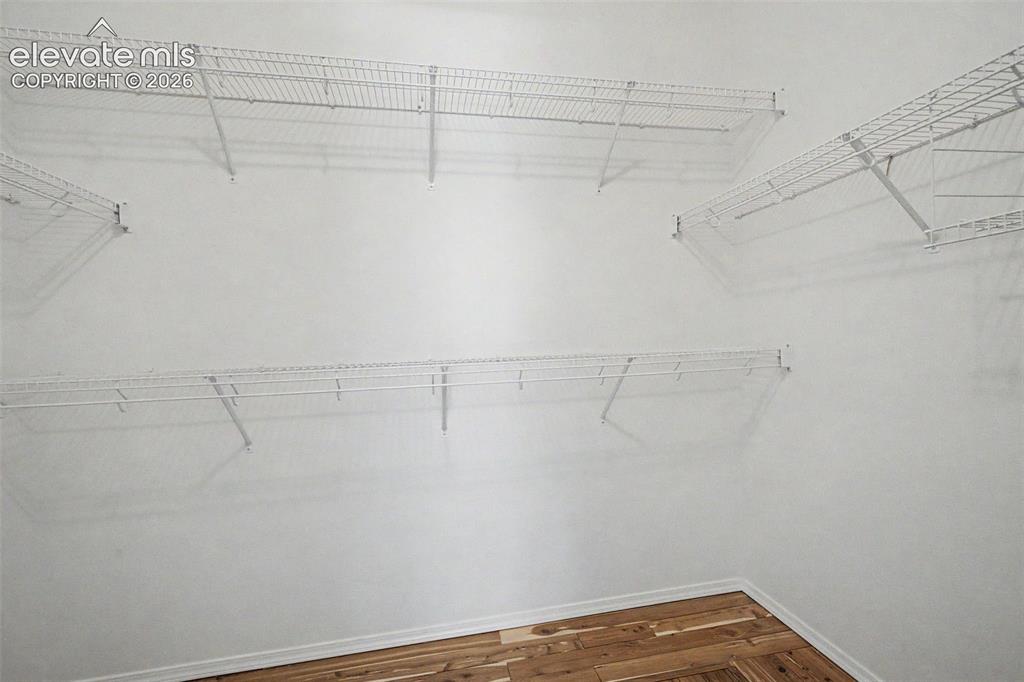 Image 29 of 49: Walk in closet