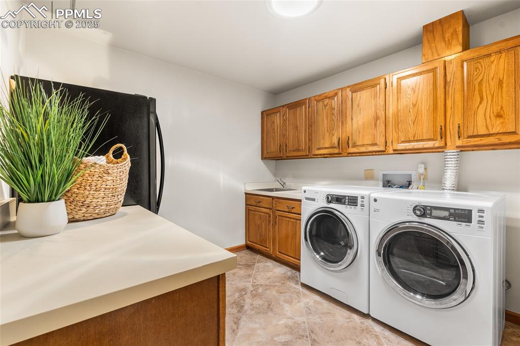 Image 32 of 36: Laundry On the Main Level Off The Primary Bedroom