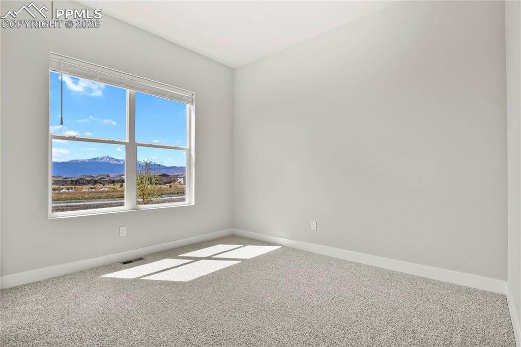 Image 18 of 33: Bedroom