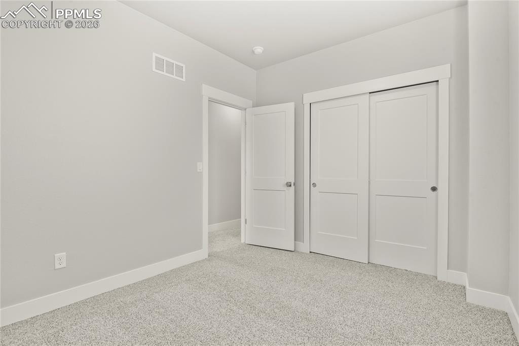 Image 26 of 33: Bedroom