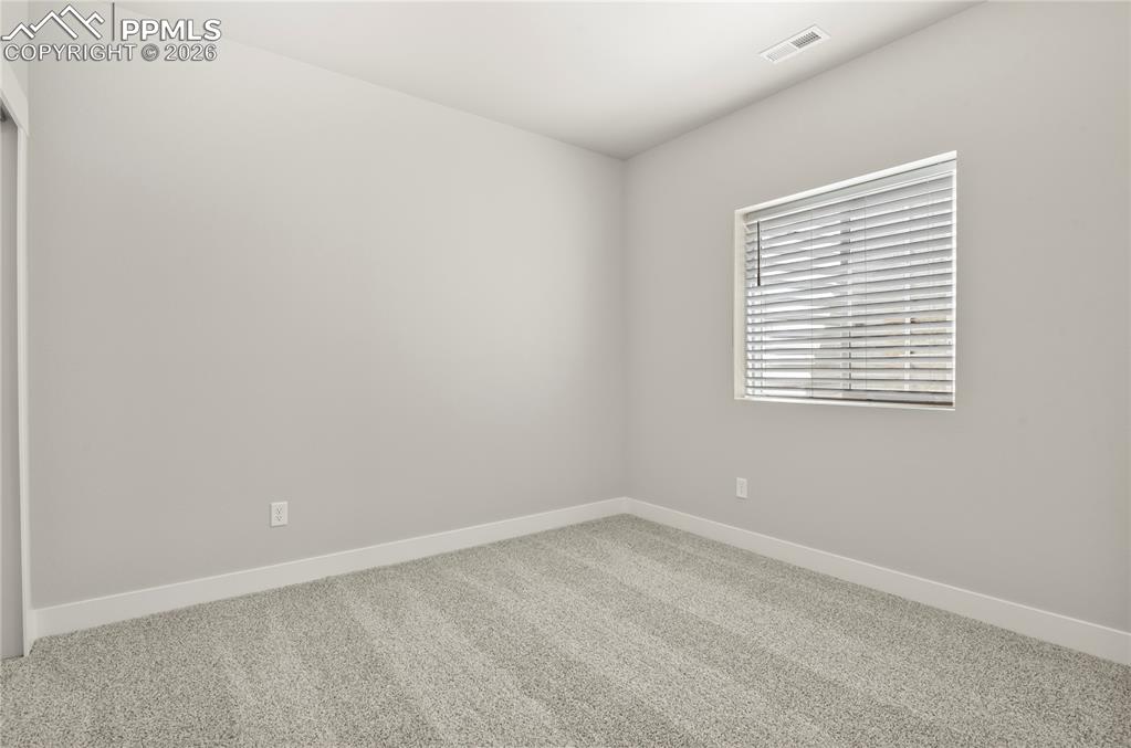 Image 28 of 33: Bedroom