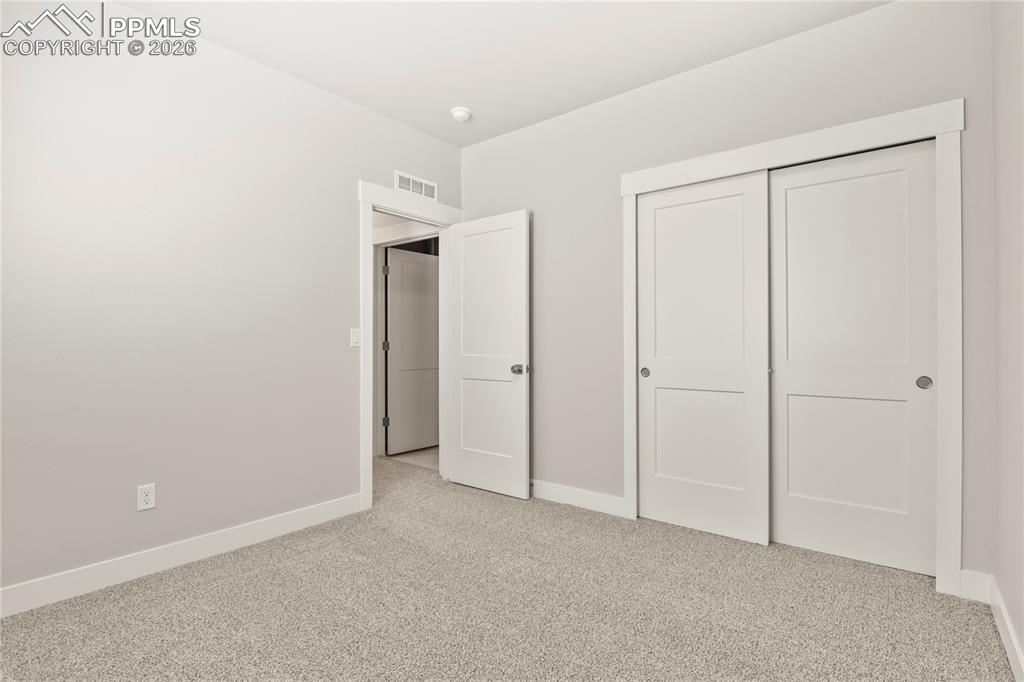 Image 29 of 33: Bedroom