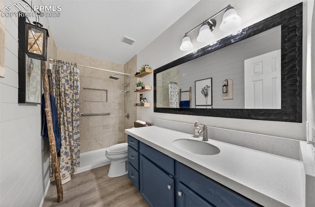 Image 14 of 37: Main Level Bathroom