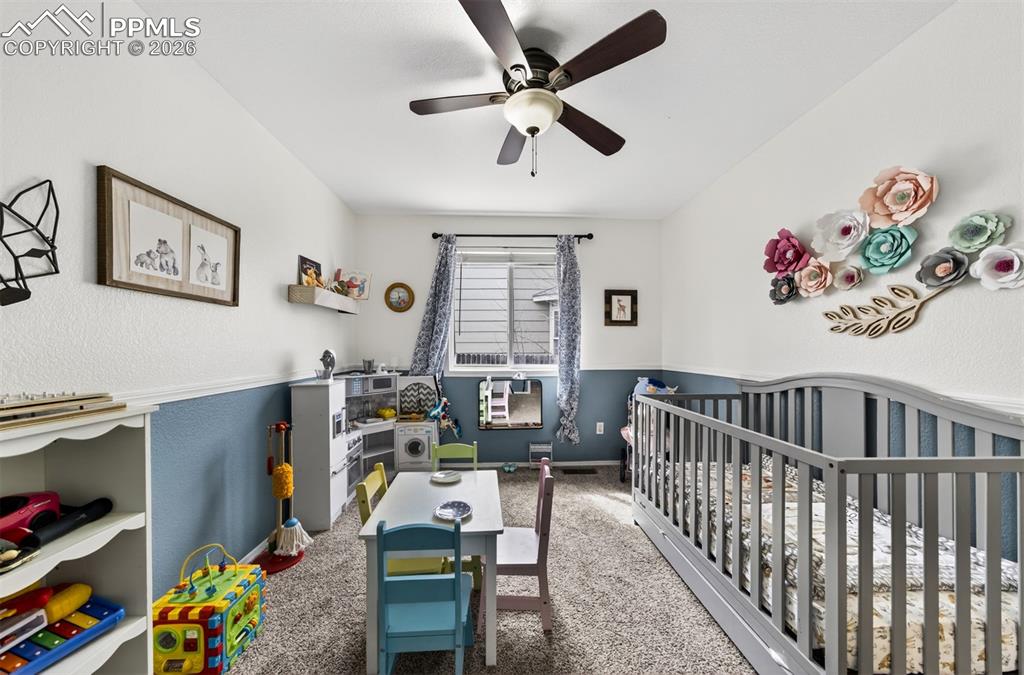 Image 15 of 37: Secondary Bedroom on the Main Level