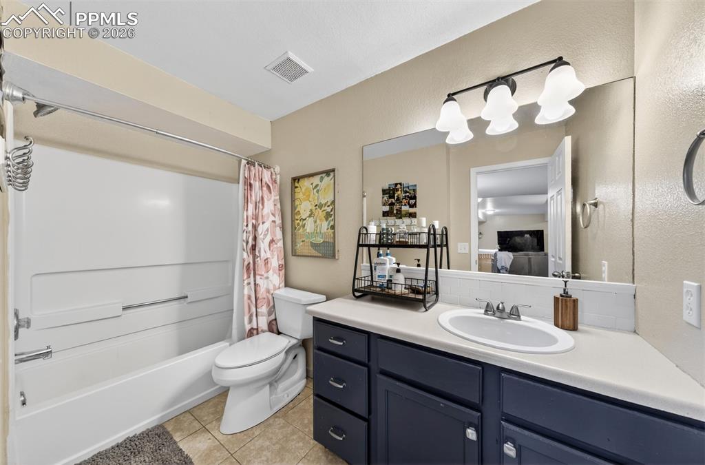 Image 20 of 37: Basement Bathroom