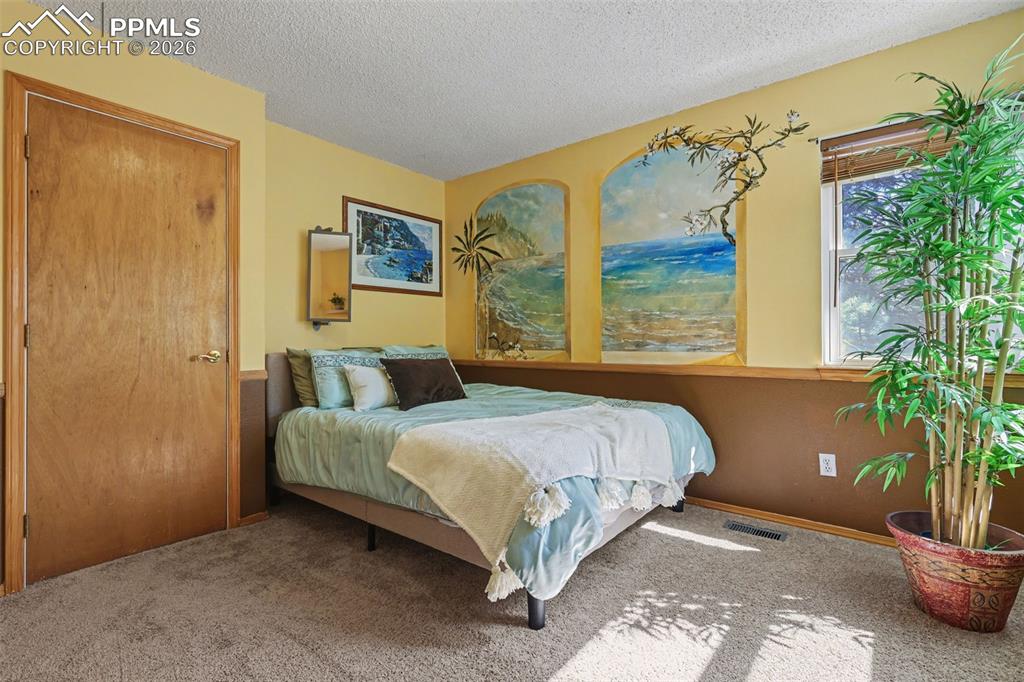 Image 28 of 39: Bedroom