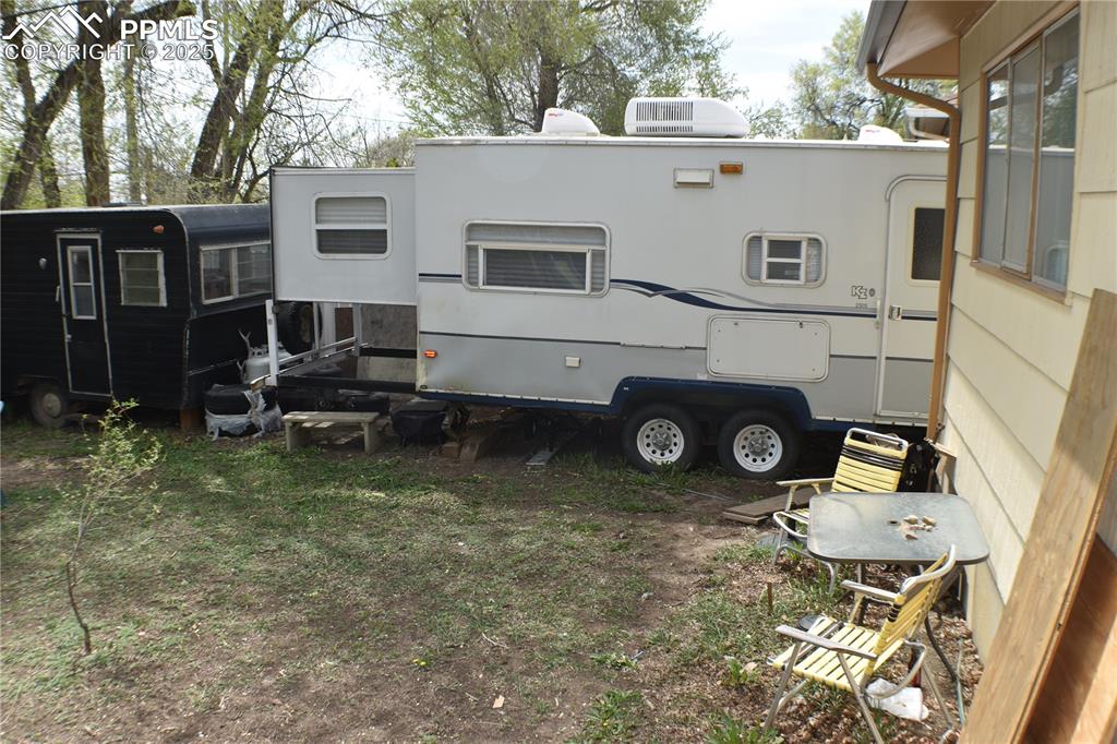 Image 25 of 31: View of rear view of property