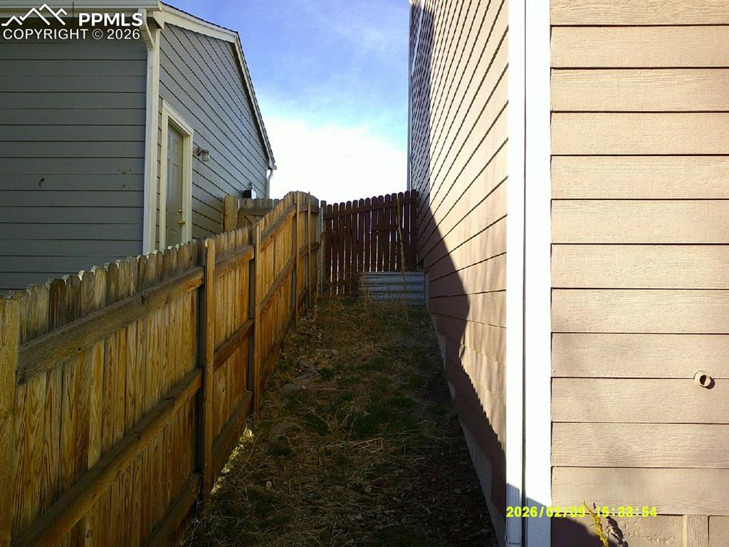 Image 17 of 21: View of side of home